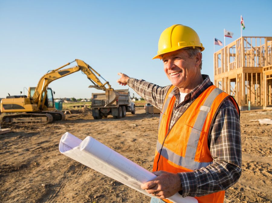 Contractor reviewing cash flow on site
